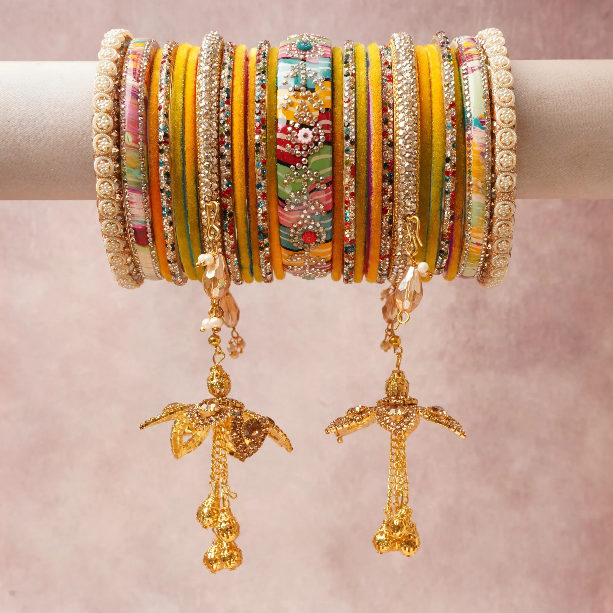 A commanding Multi colour anchors this beautiful set, enriched with accents of Golden Yellow, Crystal Clear, Garnet Red, Emerald Green, Sapphire Blue, Antique Gold, Cream Pearl that add depth and dimension.

Featuring a striking composition of Metal Alloy, Velvet Fabric, Rhinestones (Faceted Glass), Faux Pearls, Glass Beads (Faceted), Resin/Lacquer, this set carries intricate craftsmanship and strong presence. Grand in form, it is created for moments that deserve to be marked.